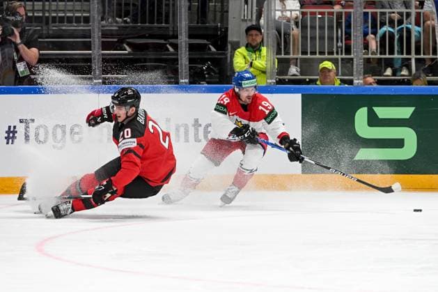 RIGA, LATVIA MAY 23 Jakub Flek of Czech Republic protects the puck against Justin Barron of Canada during the 2023 IIHF Ice Hockey World Championship Finland Latvia game between Canada and Czech Republic at Arena Riga on May 23, 2023 in Riga, Latvia Riga Arena Riga Latvia  Copyright: xJustPictures.ch AndreaxBrancax