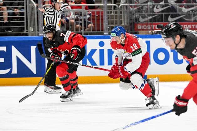 RIGA, LATVIA MAY 23 Dominik Kubalik of Czech Republic and Pierre Olivier Joseph of Canada in a race for the puck during the 2023 IIHF Ice Hockey World Championship Finland Latvia game between Canada and Czech Republic at Arena Riga on May 23, 2023 in Riga, Latvia Riga Arena Riga Latvia  Copyright: xJustPictures.ch AndreaxBrancax