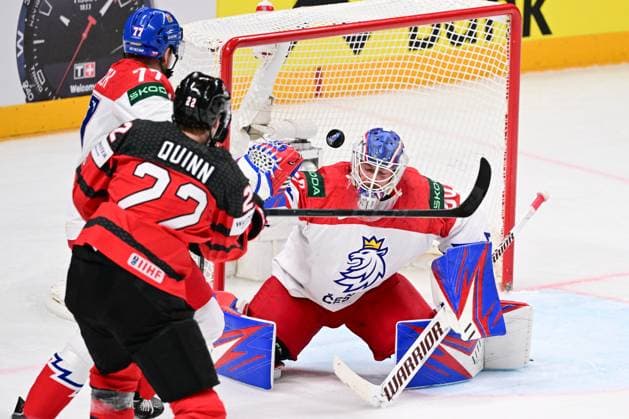 From left Czech David Nemecek, Jack Quinn of Canada and Czech goalie Karel Vejmelka in action during the IIHF Ice hockey, Eishockey World Championship, WM, Weltmeisterschaft Group B match Czech Republic vs Canada, in Riga, Latvia, May 23, 2023. (CTKxPhoto DavidxTanecek) CTKPhotoP2023052306206  CTKPhotoP2023052306206