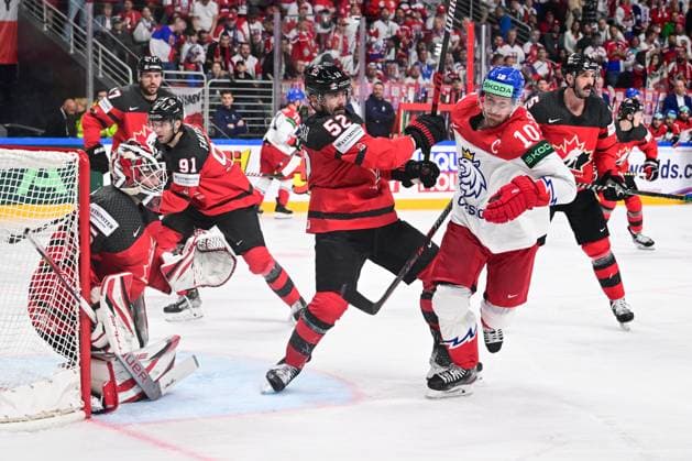 From right Czech Roman Cervenka, MacKenzie Weegar, Samuel Montembeault, both of Canada in action during the IIHF Ice hockey, Eishockey World Championship, WM, Weltmeisterschaft Group B match Czech Republic vs Canada, in Riga, Latvia, May 23, 2023. (CTKxPhoto DavidxTanecek) CTKPhotoP2023052306816 CTKPhotoP2023052306816