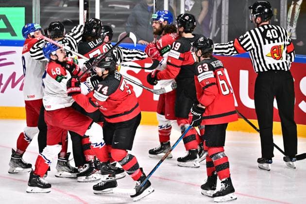 Czech hockey players fight against hockey players of Canada during the IIHF Ice hockey, Eishockey World Championship, WM, Weltmeisterschaft Group B match Czech Republic vs Canada, in Riga, Latvia, May 23, 2023. (CTKxPhoto DavidxTanecek) CTKPhotoP2023052307035  CTKPhotoP2023052307035