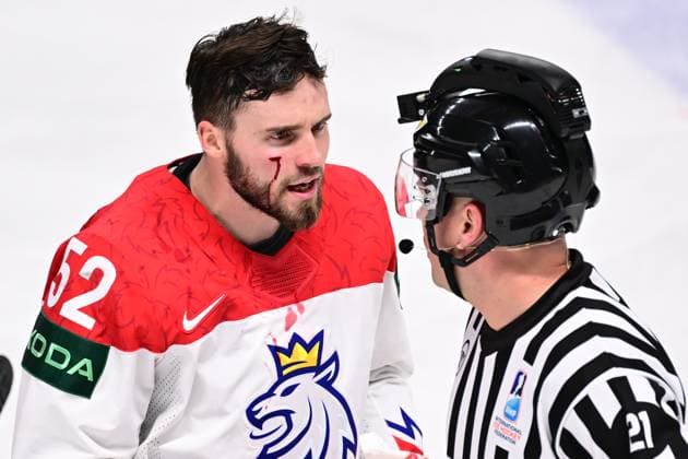 Injured Czech hockey player Michael Spacek speaks with referee during the IIHF Ice hockey, Eishockey World Championship, WM, Weltmeisterschaft Group B match Czech Republic vs Canada, in Riga, Latvia, May 23, 2023. (CTKxPhoto DavidxTanecek) CTKPhotoP2023052307061  CTKPhotoP2023052307061