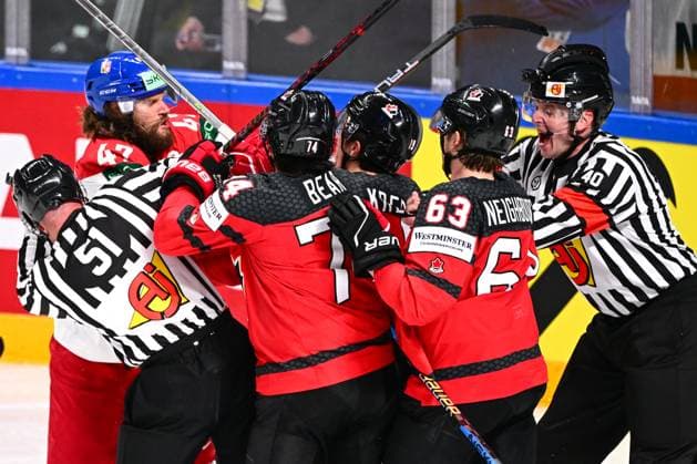 From left Czech Michal Jordan and Ethan Bear, Peyton Krebs, Jake Neighbours, all of Canada fight during the IIHF Ice hockey, Eishockey World Championship, WM, Weltmeisterschaft Group B match Czech Republic vs Canada, in Riga, Latvia, May 23, 2023. (CTKxPhoto DavidxTanecek) CTKPhotoP2023052308753 CTKPhotoP2023052308753