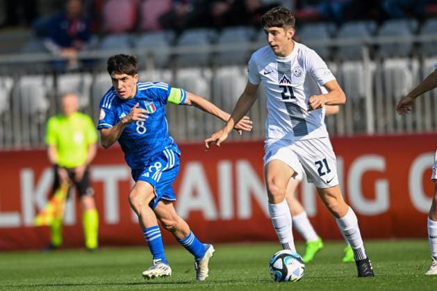 Italy U17, U 17 ¢& x80;& x99;s Mattia Mannini defending on Slovenia U17Ã¢& x80;& x99;s Matjaz Veber during the qualifying phase Under-17 Championship Hungary 2023 soccer match Italy U17 vs. Slovenia U17 at the Globall Football Park stadium in Telki, Hungary, 24th of May 2023  Copyright: xVinnyxOrlando LiveMediax xipa-agx xLivexMediax 0 IPA_IPA38190085
