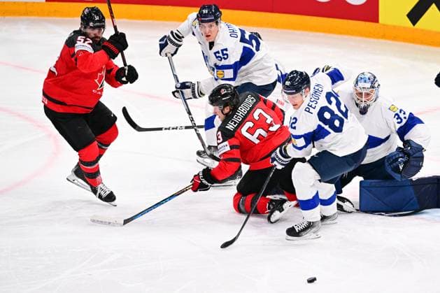 Sport Bilder des Tages L-R MacKenzie Weegar (CAN), Atte Ohtamaa (FIN), Jake Neighbours (CAN), Harri Pesonen (FIN) and goalkeeper Emil Larmiz (FIN) in action during the quarter-final match Canada vs Finland, within the IIHF Ice hockey, Eishockey World Championship, WM, Weltmeisterschaft on May 24, 2023, in Tampere, Finland. (CTKxPhoto DavidxTanecek) CTKPhotoP2023052509516 CTKPhotoP2023052509516