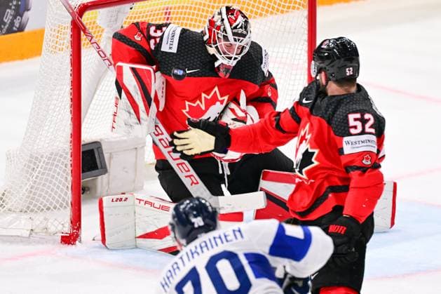 L-R goalkeeper Samuel Montembeault (CAN), MacKenzie Weegar (CAN) and Teemu Hartikainen (FIN; down) in action during the quarter-final match Canada vs Finland, within the IIHF Ice hockey, Eishockey World Championship, WM, Weltmeisterschaft on May 24, 2023, in Tampere, Finland. (CTKxPhoto DavidxTanecek) CTKPhotoP2023052509520  CTKPhotoP2023052509520