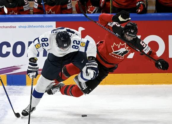 Harri Pesonen (L) of Finland and MacKenzie Weegar of Canada during the 2023 IIHF Ice hockey, Eishockey World Championships quarterfinal match between Canada and Finland in Tampere on May 25, 2023. Tampere Finland LKFTJK20230525211918JBTI  Copyright: xEmmixKorhonenx LKFTJK20230525211918JBTI
