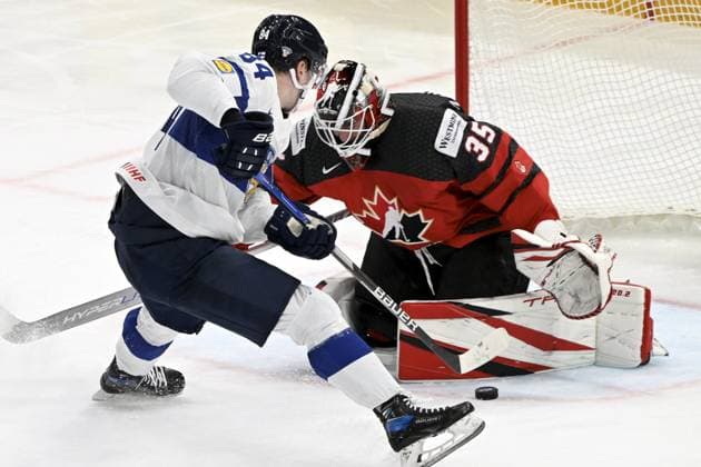 Goalkeeper Samuel Montembeault of Canada makes a save on Kaapo Kakko of Finland during the 2023 IIHF Ice hockey, Eishockey World Championships quarterfinal match between Canada and Finland in Tampere on May 25, 2023. (correcting the last name of Canada goalie) Tampere Finland LKFTJK20230525213305MLRD  Copyright: xJussixNukarix LKFTJK20230525213305MLRD