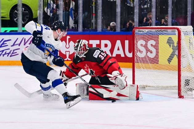 L-R Kaapo Kakko (FIN) and goalkeeper Samuel Montembeault (CAN) in action during the quarter-final match Canada vs Finland, within the IIHF Ice hockey, Eishockey World Championship, WM, Weltmeisterschaft on May 24, 2023, in Tampere, Finland. (CTKxPhoto DavidxTanecek) CTKPhotoP2023052509843  CTKPhotoP2023052509843