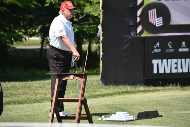 May 26, 2023, Sterling, Virginia, United States: Former President of the United States Donald J. Trump swings his put as he plays golf at his golf course. Former President of the United States Donald J. Trump plays golf prior to the LIV Golf Round 1 Shotgun Start at Trump National Golf Club Washington DC in Sterling. Prior to round one of the LIV Golf Washington DC 2023 event, Former President of the United States Donald J. Trump played golf on his golf course in Sterling, Virginia Friday morning into the afternoon. Sterling United States - ZUMAs197 20230526_zaa_s197_094 Copyright: xKylexMazzax