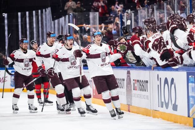 230527 Dans Locmelis of Latvia celebrates with team mates after 0 1 during the 2023 IIHF Ice Hockey World Championship semifinal game between Canada and Latvia on May 27, 2023 in Tampere Photo Joel Marklund BILDBYRAN kod JM JM0485 bbeng ishockey ice hockey ice hockey ishockey vm 2023 ishockey vm vm vm 2023 iihf ice hockey world championship semifinal semi final kanada canada latvia lettland jubel  Copyright: JOELxMARKLUND BB230527JM017