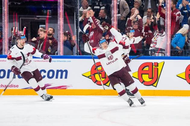 RIGA, LATVIA MAY 27 Dans Locmelis of Latvia celebrates his goal with Latvian fans during the 2023 IIHF Ice Hockey World Championship Finland Latvia game between Canada and Latvia at Nokia Arena on May 27, 2023 in Tampere, Finland Tampere Finland  Copyright: xJustPictures.ch JarixPestelaccix