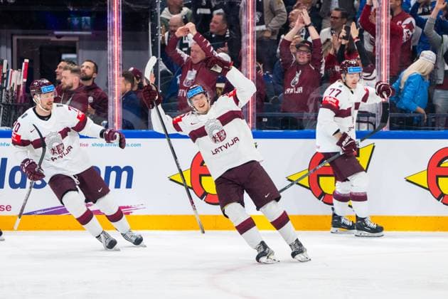 RIGA, LATVIA MAY 27 Dans Locmelis of Latvia celebrates his goal with Latvian fans during the 2023 IIHF Ice Hockey World Championship Finland Latvia game between Canada and Latvia at Nokia Arena on May 27, 2023 in Tampere, Finland Tampere Finland  Copyright: xJustPictures.ch JarixPestelaccix