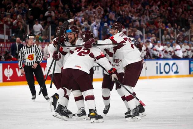 Latvian players celebrating a goal during the 2023 IIHF Ice hockey, Eishockey World Championship, WM, Weltmeisterschaft Semifinal match between Canada - Latvia at the Nokia Arena on 27. May 2023 in Tampere, Finland. (KALLE PARKKINEN Newspix24)  Copyright: xKallexParkkinenx np24271458262