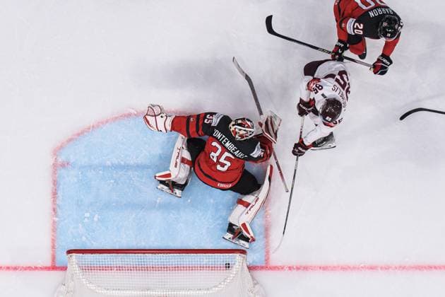 230527 Dans Locmelis of Latvia scores 0 1 behind goaltender Samuel Montembeault of Canada during the 2023 IIHF Ice Hockey World Championship semifinal game between Canada and Latvia on May 27, 2023 in Tampere Photo Joel Marklund BILDBYRAN kod JM JM0485 bbeng ishockey ice hockey ishockey vm 2023 ishockey vm vm 2023 iihf ice hockey world championship semifinal semi final kanada canada latvia lettland  Copyright: JOELxMARKLUND BB230527JM021