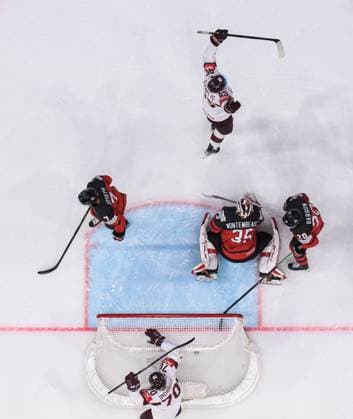 230527 Miks Indrasis and Dans Locmelis of Latvia celebrate the 0 1 goal behind goaltender Samuel Montembeault of Canada during the 2023 IIHF Ice Hockey World Championship semifinal game between Canada and Latvia on May 27, 2023 in Tampere Photo Joel Marklund BILDBYRAN kod JM JM0485 bbeng ishockey ice hockey ishockey vm 2023 ishockey vm vm vm 2023 iihf ice hockey world championship semifinal semi final kanada canada latvia lettland jubel depp  Copyright: JOELxMARKLUND BB230527JM022