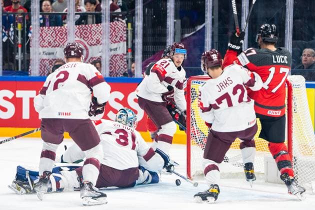 RIGA, LATVIA MAY 27 Milan Lucic of Canada R close to score the 1 1 during the 2023 IIHF Ice Hockey World Championship Finland game between Canada and Latvia at Nokia Arena on May 27, 2023 in Tampere, Finland Tampere Finland  Copyright: xJustPictures.ch JarixPestelaccix