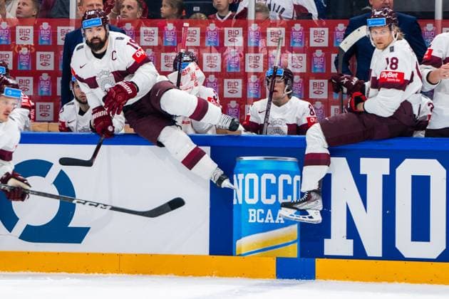 RIGA, LATVIA MAY 27 Kaspars Daugavins of Latvia L and Rodrigo Abols of Latvia R ready for their shift during the 2023 IIHF Ice Hockey World Championship Finland Latvia game between Canada and Latvia at Nokia Arena on May 27, 2023 in Tampere, Finland Tampere Finland  Copyright: xJustPictures.ch JarixPestelaccix