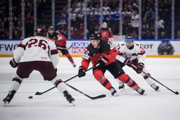 230527 Uvis Janis Balinskis and Deniss Smirnovs of Latvia are being challenged by Jack Quinn of Canada during the 2023 IIHF Ice Hockey World Championship semifinal game between Canada and Latvia on May 27, 2023 in Tampere Photo Joel Marklund BILDBYRAN kod JM JM0485 bbeng ishockey ice hockey ishockey vm 2023 ishockey vm vm 2023 iihf ice hockey world championship semifinal semi final kanada canada latvia lettland  Copyright: JOELxMARKLUND BB230527JM023