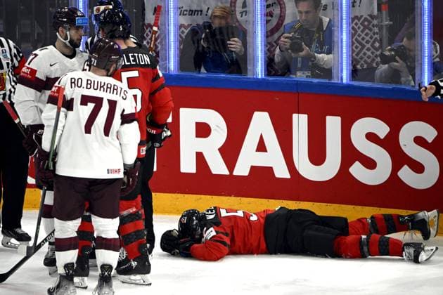 MacKenzie Weegar of Canada injured on ice during the 2023 IIHF Ice hockey, Eishockey World Championships semifinal match between Canada and Latvia in Tampere on May 27, 2023. Tampere Finland LKFTJK20230527153536OJWA  Copyright: xJussixNukarix LKFTJK20230527153536OJWA