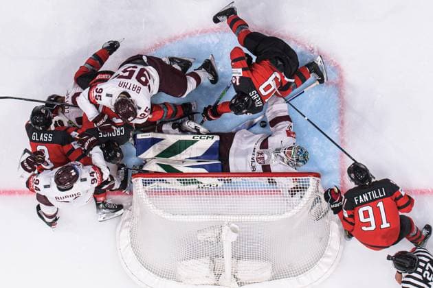 230527 Cody Glass, Lawson Crouse, Peyton Krebs and Adam Fantilli of Canada challenge Kristians Rubins, Karlis Cukste, Oskars Batna and goaltender Arturs Silovs of Latvia during the 2023 IIHF Ice Hockey World Championship semifinal game between Canada and Latvia on May 27, 2023 in Tampere Photo Joel Marklund BILDBYRAN kod JM JM0485 bbeng ice hockey ice hockey ishockey vm 2023 ishockey vm vm vm 2023 iihf ice hockey world championship semifinal semi final canada canada latvia lettland  Copyright: JOELxMARKLUND BB230527JM041