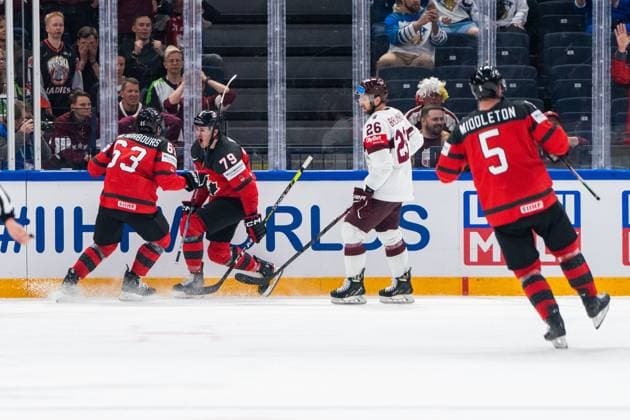 RIGA, LATVIA MAY 27 Samuel Blais of Canada 2nd from L celebrating his goal with Jake Neighbours of Canada L during the 2023 IIHF Ice Hockey World Championship Finland Latvia game between Canada and Latvia at Nokia Arena on May 27, 2023 in Tampere, Finland Tampere Finland  Copyright: xJustPictures.ch JarixPestelaccix