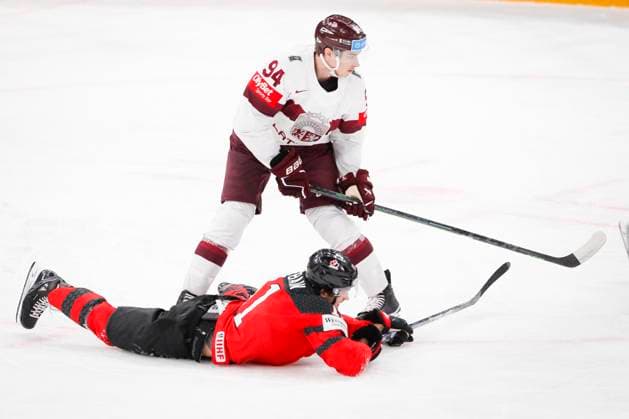Jack Mcbain 11, CAN and Kristians Rubins 94, LAT during the 2023 IIHF Ice hockey, Eishockey World Championship, WM, Weltmeisterschaft Semifinal match between Canada - Latvia at the Nokia Arena on 27. May 2023 in Tampere, Finland. (KALLE PARKKINEN Newspix24)  Copyright: xKallexParkkinenx np24271558276