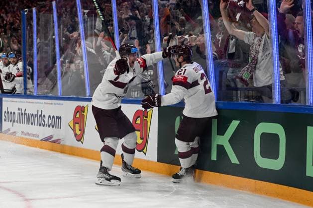 RIGA, LATVIA MAY 27 Rudolfs Balcers of Latvia R celebrate after scoring a goal with teammate Rodrigo Abols of Latvia R during the 2023 IIHF Ice Hockey World Championship Finland game between Canada and Latvia at Nokia Arena on May 27, 2023 in Tampere, Finland Tampere Finland  Copyright: xJustPictures.ch AndreaxBrancax