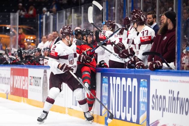 230527 Karlis Cukste of Latvia and Jake Neighbours of Canada during the 2023 IIHF Ice Hockey World Championship semifinal game between Canada and Latvia on May 27, 2023 in Tampere Photo Joel Marklund BILDBYRAN kod JM JM0485 bbeng ishockey ice hockey ishockey vm 2023 ishockey vm vm vm 2023 iihf ice hockey world championship semifinal semi final canada canada latvia lettland  Copyright: JOELxMARKLUND BB230527JM048