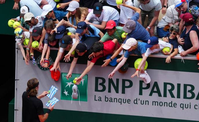Mandatory Credit: Photo by Javier Garcia Shutterstock (13925673bw) Stefanos Tsitsipas hands out pre-signed photos to fans after his practice with Carlos Alcaraz French Open Tennis, Saturday Qualifying and Previews, Roland Garros, Paris, France - 27 May 2023 French Open Tennis, Saturday Qualifying and Previews, Roland Garros, Paris, France - 27 May 2023  Copyright: xJavierxGarcia Shutterstockx 13925673bw