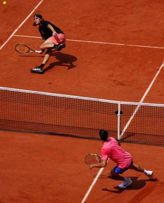 Mandatory Credit: Photo by Javier Garcia Shutterstock (13925673bx) Stefanos Tsitsipas slips over during a practice match against Carlos Alcaraz French Open Tennis, Saturday Qualifying and Previews, Roland Garros, Paris, France - 27 May 2023 French Open Tennis, Saturday Qualifying and Previews, Roland Garros, Paris, France - 27 May 2023  Copyright: xJavierxGarcia Shutterstockx 13925673bx