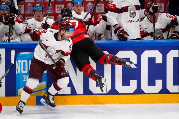 Deniss Smirnovs 73, LAT and Brad Hunt 77, CAN during the 2023 IIHF Ice hockey, Eishockey World Championship, WM, Weltmeisterschaft Semifinal match between Canada - Latvia at the Nokia Arena on 27. May 2023 in Tampere, Finland. (KALLE PARKKINEN Newspix24)  Copyright: xKallexParkkinenx np24271658305
