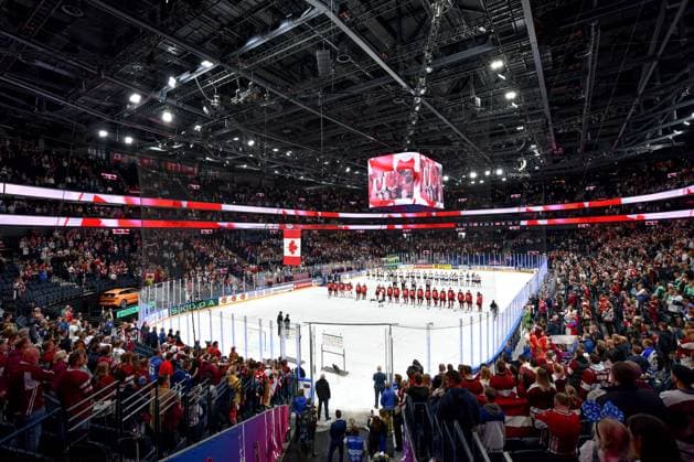 RIGA, LATVIA MAY 27 Canadian players listen to the national anthem during the 2023 IIHF Ice Hockey World Championship Finland Latvia game between Canada and Latvia at Nokia Arena on May 27, 2023 in Tampere, Finland Tampere Finland  Copyright: xJustPictures.ch AndreaxBrancax