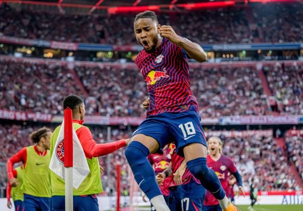 Leipzigs Christopher Nkunku celebrates after scoring the 2 1 Football 1 Bundesliga, 33 Matchday FC Bayern Muenchen RB Leipzig 1 3 20 May 2023 Munich, Allianz Arena FC Bayern Muenchen RB Leipzig 1 3