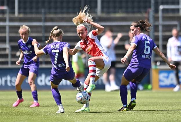 Soccer Women Flyeralarm Bundesliga Season 2022 2023 22 Matchday 1 FC Cologne SGS Essen on 28 05 2023 at Franz Kremer Stadium in Cologne Antonia Baaß SGS Essen , left Mandy Islacker 1 FC Cologne , middle Katharina Piljic SGS Essen , right DFB regulations prohibit any use of photographs as image sequences and or quasi video North Rhine Westphalia Germany