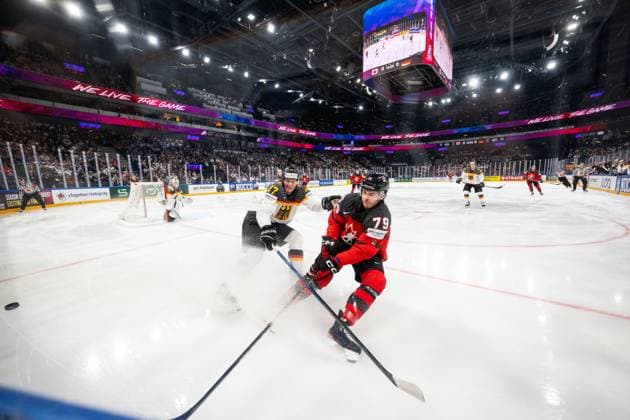 230528 Maksymilian Szuber of Germany and Samuel Blais of Canada during the 2023 IIHF Ice Hockey World Championship final game between Canada and Germany on May 28, 2023 in Tampere Photo Joel Marklund BILDBYRAN kod JM JM0489 bbeng ishockey ice hockey ice hockey ishockey vm 2023 ishockey vm vm vm 2023 iihf ice hockey world championship final canada canada germany germany  Copyright: JOELxMARKLUND BB230528JM098