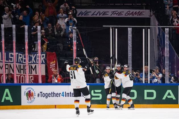 230528 Moritz Müller, Dominik Kahun, John Peterka and Frederik Tiffels of Germany celebrate scoring 0 1 during the 2023 IIHF Ice Hockey World Championship final game between Canada and Germany on May 28, 2023 in Tampere Photo Joel Marklund BILDBYRAN kod JM JM0489 bbeng ishockey ice hockey ice hockey vm 2023 ishockey vm vm vm 2023 iihf ice hockey world championship final canada canada germany germany jubel  Copyright: JOELxMARKLUND BB230528JM103