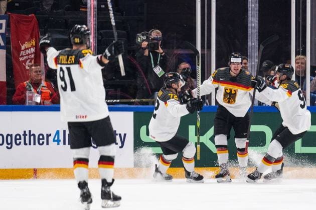 230528 Moritz Müller, Dominik Kahun, John Peterka and Frederik Tiffels of Germany celebrate scoring 0 1 during the 2023 IIHF Ice Hockey World Championship final game between Canada and Germany on May 28, 2023 in Tampere Photo Joel Marklund BILDBYRAN kod JM JM0489 bbeng ishockey ice hockey ice hockey vm 2023 ishockey vm vm vm 2023 iihf ice hockey world championship final canada canada germany germany jubel  Copyright: JOELxMARKLUND BB230528JM104