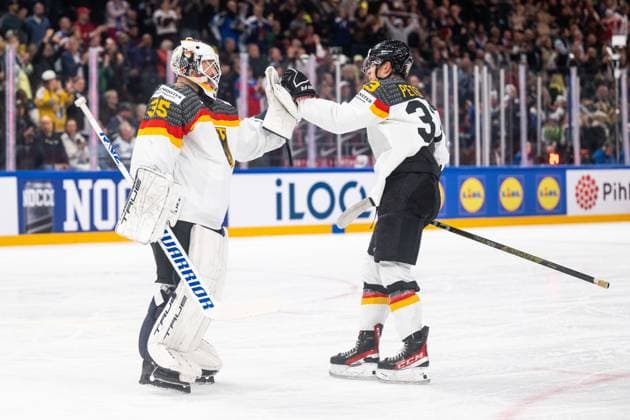 230528 Goaltender Mathias Niederberger and John Peterka of Germany celebrate scoring 0 1 during the 2023 IIHF Ice Hockey World Championship final game between Canada and Germany on May 28, 2023 in Tampere Photo Joel Marklund BILDBYRAN kod JM JM0489 bbeng ishockey ice hockey ice hockey vm 2023 ishockey vm vm vm 2023 iihf ice hockey world championship final canada canada germany germany jubel  Copyright: JOELxMARKLUND BB230528JM105