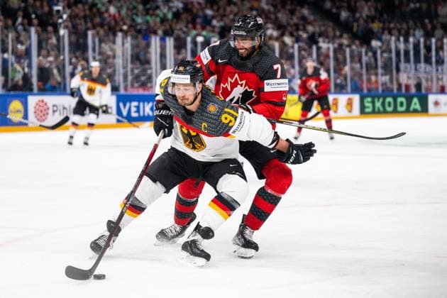 230528 Moritz Müller of Germany and Pierre Olivier Joseph of Canada during the 2023 IIHF Ice Hockey World Championship final game between Canada and Germany on May 28, 2023 in Tampere Photo Joel Marklund BILDBYRAN kod JM JM0489 bbeng ishockey ice hockey ice hockey vm 2023 ishockey vm vm vm 2023 iihf ice hockey world championship final canada canada germany germany  Copyright: JOELxMARKLUND BB230528JM108