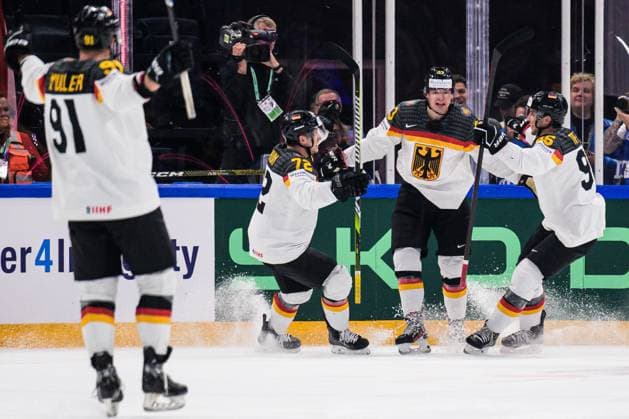 230528 Moritz Müller, Dominik Kahun, John Peterka and Frederik Tiffels of Germany celebrate the 0 1 goal during the 2023 IIHF Ice Hockey World Championship final game between Canada and Germany on May 28, 2023 in Tampere Photo Joel Marklund BILDBYRAN kod JM JM0489 bbeng ishockey ice hockey ice hockey vm 2023 ishockey vm vm vm 2023 iihf ice hockey world championship final canada canada germany germany jubel  Copyright: JOELxMARKLUND BB230528JM109