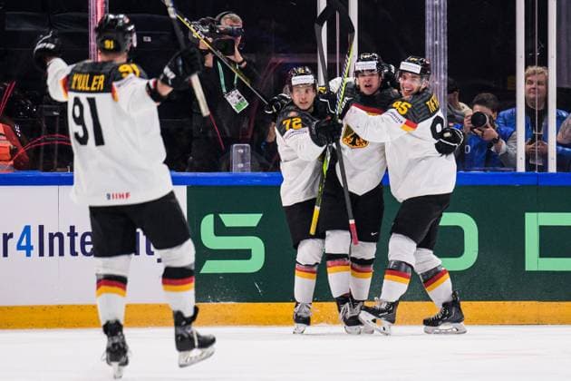 230528 Moritz Müller, Dominik Kahun, John Peterka and Frederik Tiffels of Germany celebrate the 0 1 goal during the 2023 IIHF Ice Hockey World Championship final game between Canada and Germany on May 28, 2023 in Tampere Photo Joel Marklund BILDBYRAN kod JM JM0489 bbeng ishockey ice hockey ice hockey vm 2023 ishockey vm vm vm 2023 iihf ice hockey world championship final canada canada germany germany jubel  Copyright: JOELxMARKLUND BB230528JM110