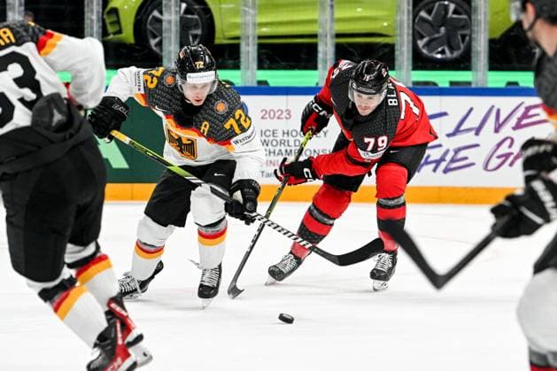 TAMPERE, FINLAND MAY 28 Samuel Blais of Canada in a battle for the puck with Dominik Kahun of Germany during the 2023 IIHF Ice Hockey World Championship Finland Latvia game between Canada and Germany at Nokia Arena on May 28, 2023 in Tampere, Finland Tampere Nokia Arena Finland  Copyright: xJustPictures.ch AndreaxBrancax