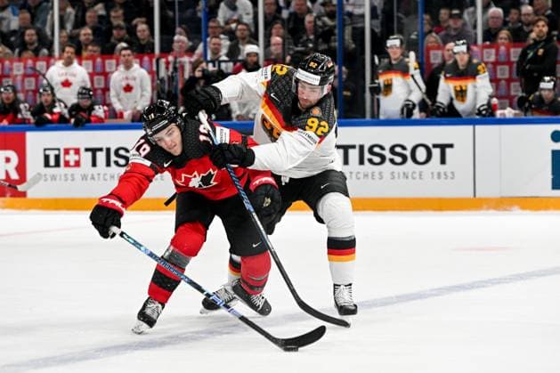TAMPERE, FINLAND MAY 28 Marcel Noebels of Germany tries to stop Peyton Krebs of Canada during the 2023 IIHF Ice Hockey World Championship Finland Latvia game between Canada and Germany at Nokia Arena on May 28, 2023 in Tampere, Finland Tampere Nokia Arena Finland  Copyright: xJustPictures.ch AndreaxBrancax
