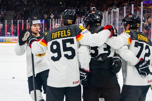 TAMPERE, FINLAND MAY 28 Moritz Seider of Germany L joins Frederik Tiffels of Germany 2nd from L , Dominik Kahun of Germany R celebrating John Peterka of Germany C during the 2023 IIHF Ice Hockey World Championship Finland Latvia game between Canada and Germany at Nokia Arena on May 28, 2023 in Tampere, Finland Tampere Nokia Arena Finland  Copyright: xJustPictures.ch JarixPestelaccix
