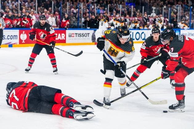 TAMPERE, FINLAND MAY 28 Parker Tuomie of Germany C stopped by Tyler Myers of Canada L and Pierre Olivier Joseph of Canada R during the 2023 IIHF Ice Hockey World Championship Finland Latvia game between Canada and Germany at Nokia Arena on May 28, 2023 in Tampere, Finland Tampere Nokia Arena Finland  Copyright: xJustPictures.ch JarixPestelaccix