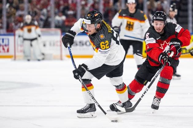 230528 Parker Tuomie of Germany and Cody Glass of Canada during the 2023 IIHF Ice Hockey World Championship final game between Canada and Germany on May 28, 2023 in Tampere Photo Joel Marklund BILDBYRAN kod JM JM0489 bbeng ishockey ice hockey ishockey vm 2023 ishockey vm vm vm 2023 iihf ice hockey world championship final canada canada germany germany  Copyright: JOELxMARKLUND BB230528JM113