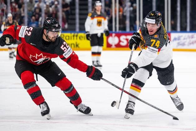 230528 MacKenzie Weegar of Canada and Justin Schutz of Germany during the 2023 IIHF Ice Hockey World Championship final game between Canada and Germany on May 28, 2023 in Tampere Photo Joel Marklund BILDBYRAN kod JM JM0489 bbeng ishockey ice hockey ice hockey vm 2023 ishockey vm vm vm 2023 iihf ice hockey world championship final canada canada germany germany  Copyright: JOELxMARKLUND BB230528JM116