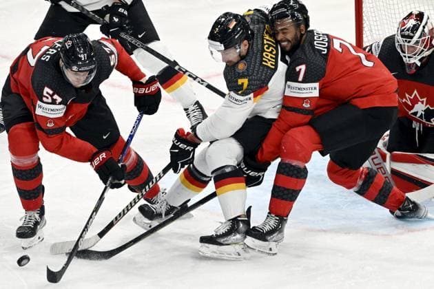 Tyler Myers (57) and Pierre-Olivier Joseph of Canada and Maximilian Kastner of Germany (7) during the 2023 IIHF Ice hockey, Eishockey World Championships final match between Canada and Germany in Tampere on May 28, 2023. Tampere Finland LKFTJK20230528211739GDMA  Copyright: xJussixNukarix LKFTJK20230528211739GDMA