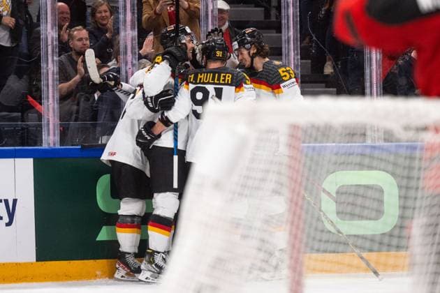 230528 Daniel Fischbuch of Germany celebrates with teammates after scoring 1 2 during the 2023 IIHF Ice Hockey World Championship final game between Canada and Germany on May 28, 2023 in Tampere Photo Joel Marklund BILDBYRAN kod JM JM0489 bbeng ishockey ice hockey ice hockey ishockey vm 2023 ishockey vm vm vm 2023 iihf ice hockey world championship final canada canada germany germany jubel  Copyright: JOELxMARKLUND BB230528JM121